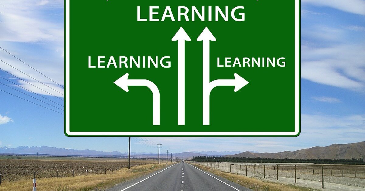 Educational road sign with 'learning' repeated.